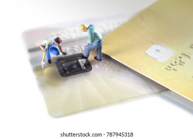 Credit Cards Theft Concept. Mini Figures Hacker Steal Credit Cards  Information On Ship Card Usecurity  For Unauthorized Shopping. Unauthorized Payments On White Background