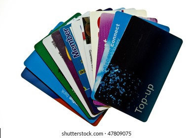 Credit, Debit And Store Cards In A Fan Shape Isolated On White