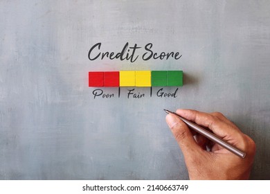 Credit score concept. Wooden cubes with text Poor, Fair and Good. - Shutterstock ID 2140663749