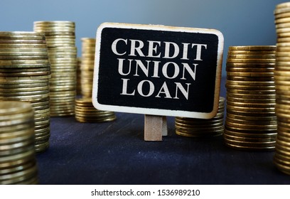 Credit Union Loan Sign On Wooden Plate And Money.