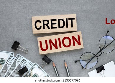 Credit Union. Text On Wooden Sides On A Gray Background