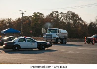 CREEK COUNTY, OKLAHOMA - AUGUST 6 2012: Oklahoma Highway Patrol Directing Traffic After Wildfires Burned 60 000 Acres And Dozens Of Homes  On August 6, 2012 In Creek County, Oklahoma, USA