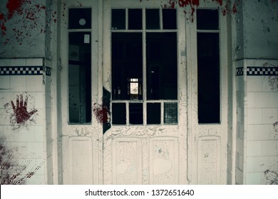 Creepy Bloody Door Of The Haunted Asylum. Abandoned And Decayed Building Of Psychiatric Hospital.