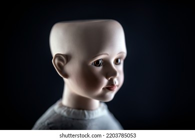 Creepy Doll Face On Dark Background