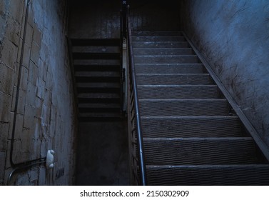 Creepy empty stairs that leads down to darkness and despair 