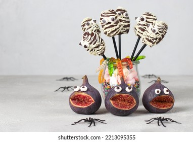 Creepy Fig Monsters, Mummy Shaped Chocolate Cake Pops And Gummy Worms For Halloween Party