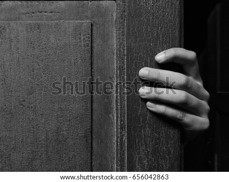 creepy hand open the door