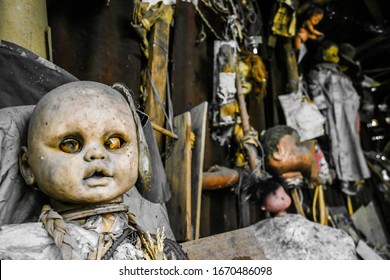 Creepy old dolls in the abandoned Island of the Dolls, Xochimilco, southern Mexico City
