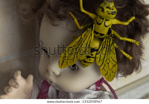 creepy doll with big eyes