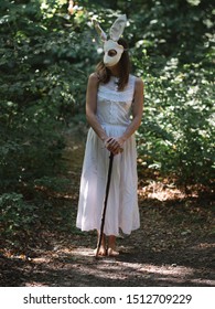 Creepy Woman In Rabbit Mask In Forest