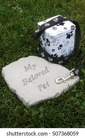 Cremated Remains Next To A Pet Memorial Stone