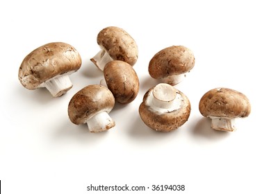 Cremini Mushrooms On White Surface