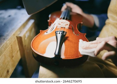 Cremona, Italy - February 6th 2025 the meticulous craft of violin making a luthier's dedication shown by expert hands fine-tuning the musical instrument with precision using traditional tools and - Powered by Shutterstock - Get 15% off with code: PIKWIZARD15