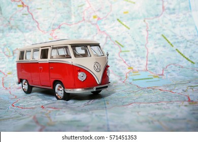 Cremona, Italy - January 09, 2017: Miniature of a Volkswagen Van Bulli 1962 on a road map.