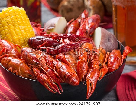 Creole style crawfish boil serving with corn and boiled potato