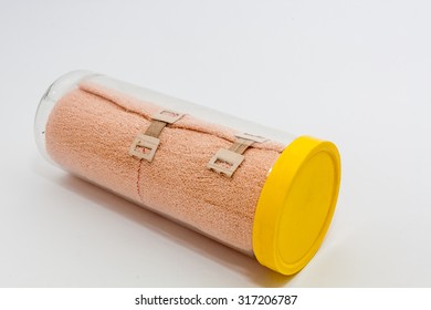 Crepe Bandage In Round Plastic Box With Yellow Lid