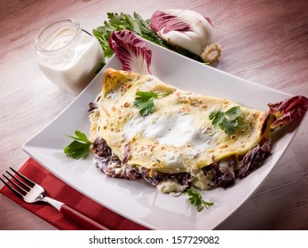 crepes with chicory and cheese