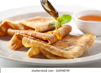 Crepes With Honey And Mint Leaf