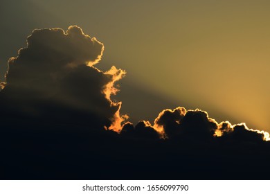 Crepuscular Rays Formed By A Cloud