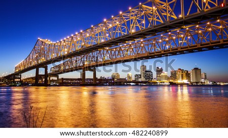 Crescent City Connection Bridge carries traffic over the Mississippi River into New Orleans at night