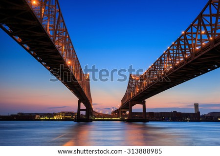 The Crescent City Connection Bridge on the Mississippi river in New Orleans Louisiana