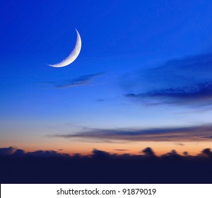 Crescent Moon With Beautiful Sunset Background