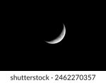 Crescent Moon is in black sky, close up astronomic photo