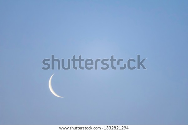 crescent moon at blue\
nights and clear sky