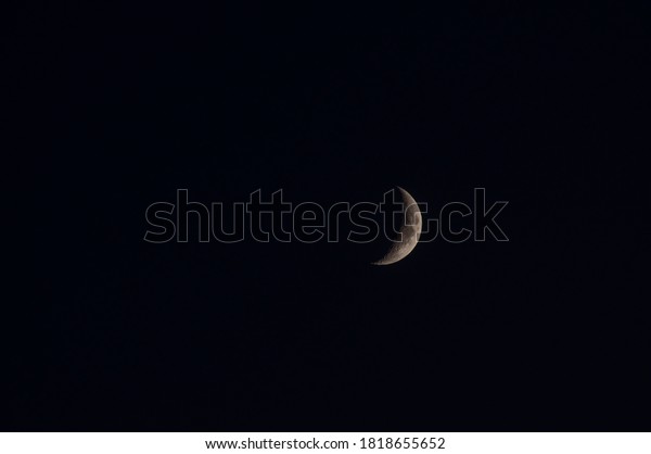 Crescent Moon. Moon in\
Clouds. The Background of the Moon in the Starry Sky. Moonlight in\
the Night Sky.