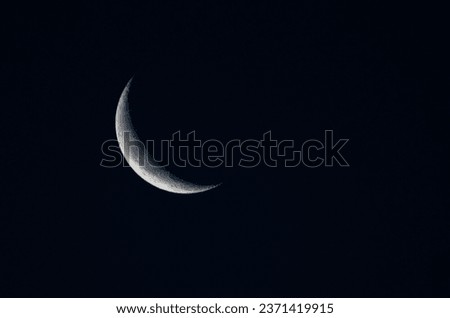 Crescent moon in the dark blue night sky, natural background. Foto d'archivio © 