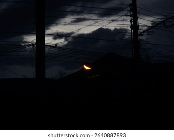 Crescent moon illuminating the dark night sky.
Tangled power lines and building silhouettes create an intriguing composition. Ideal for mysterious, urban, or grunge design projects. - Powered by Shutterstock - Get 15% off with code: PIKWIZARD15