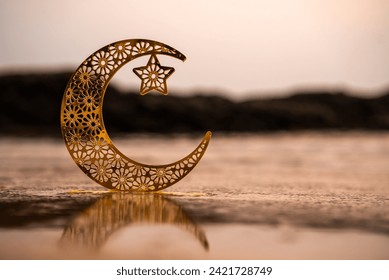 crescent moon shape on the beach, 2024 eid mubarak theme, golden moon  - Powered by Shutterstock