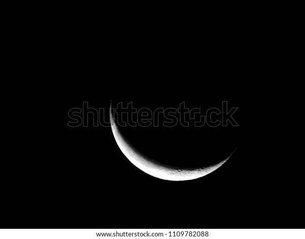 Crescent Moon / A\
crescent shape is a symbol or emblem used to represent the lunar\
phase in the first\
quarter