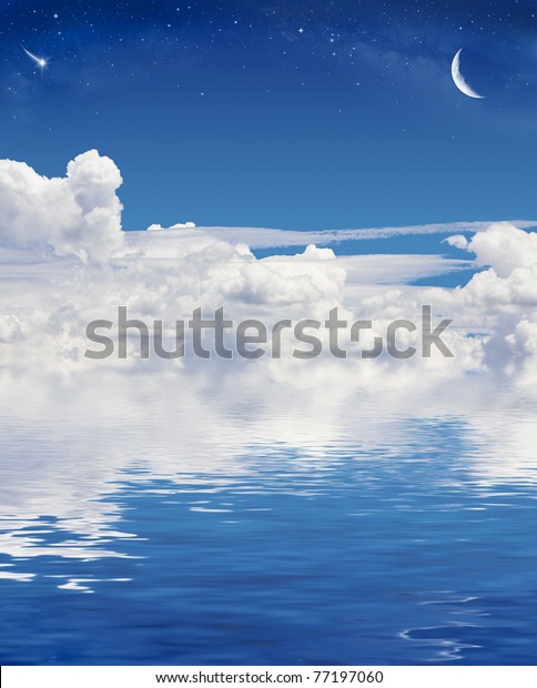 A crescent moon and shooting star above a sky
of clouds reflected in a calm
sea.