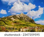 Crested Butte Colorado USA. Ski lodges sit at bottom on mountain in springtime