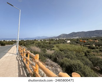 Crete's landscape is a captivating blend of rugged mountains, pristine beaches, and fertile valleys. Olive groves dot the hillsides, while ancient ruins and charming villages punctuate the terrain. - Powered by Shutterstock