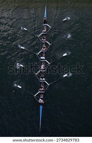 Crew Team Rowing in Competition