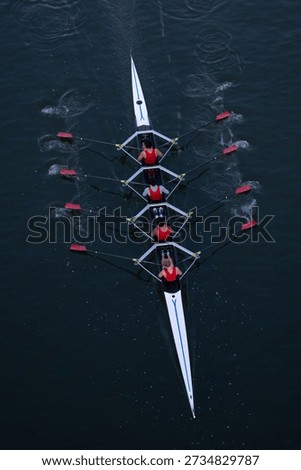Crew Team Rowing in Competition