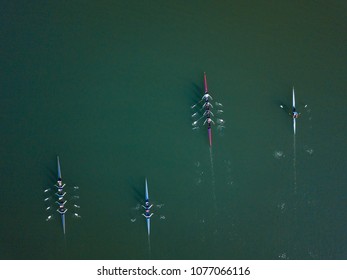 Crew Team Rowing On A Lake