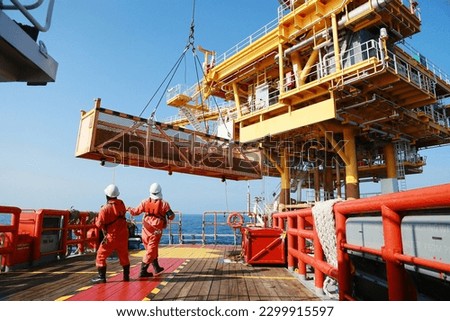 Crews boat moving the passenger and cargo from the platform to supply boat in oil and gas industry. Support offshore oil and gas industry by boat and service team.
