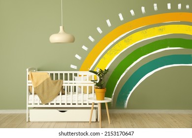 Crib Near Green Wall With Painted Rainbow In Children's Room