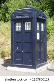 CRICH, ENGLAND JULY 8 2018 A Blue Police Telephone Box At The National Tramway Museum. The Box Is Often Associated With The Science Fiction Television Programme Doctor Who