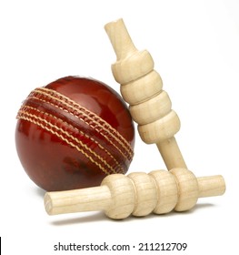 Cricket Ball And Bails Isolated On White