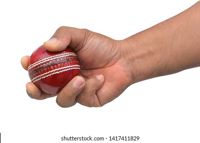 Cricket Ball In Hand Holding Isolated On White Background, This Has Clipping Path.