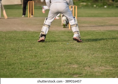 Cricket game was playing in field at Calcutta, India by boy. - Powered by Shutterstock