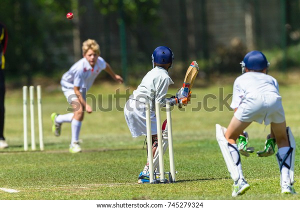 Cricket Juniors Bowler Ball Batsman Cricket Stock Image