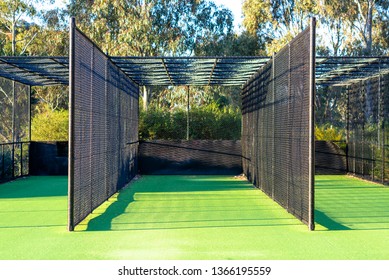 A cricket practice net on green grass in Melbourne, Victoria, Australia