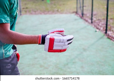 Cricket Sports Glove Close Up. Man Playing Cricket Outdoors