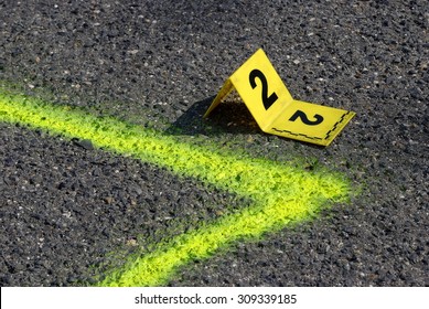 Crime Evidence Marker On Asphalt