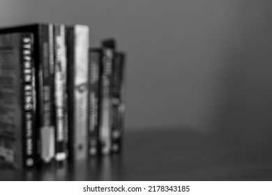 Crime Novel Books Stacked On A Table Ready To Be Read